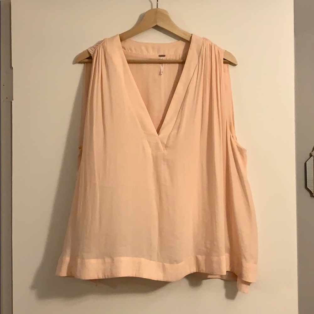 Free people peachy blouse.